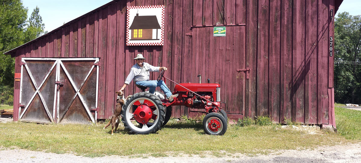 farm, farm equipment and red barn in el dorado county